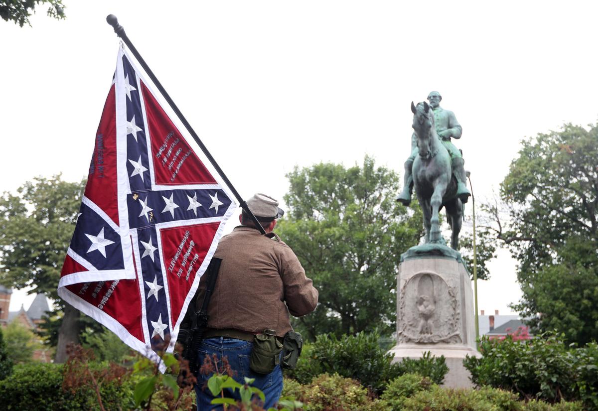 NC man carrying gun, Confederate flag confronted in Emancipation Park