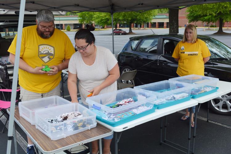 Local teachers sewing masks, printing 3D straps for workers, public