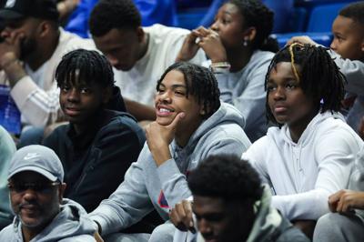 Star recruit Darius Acuff Jr., middle, sat with fellow class of 2025 standouts Caleb Wilson, left, and Jasper Johnson in the Rupp Arena crowd for last year's Big Blue Madness.