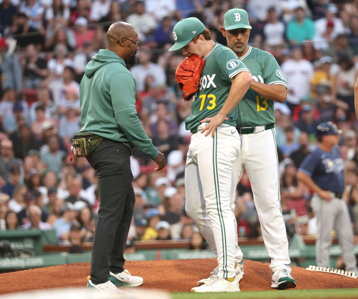 Boston Red Sox pitcher Hunter Dobbins is removed from the game after an injury in the second inning against the Tampa Bay Rays at Fenway Park on July 11, 2025, in Boston.