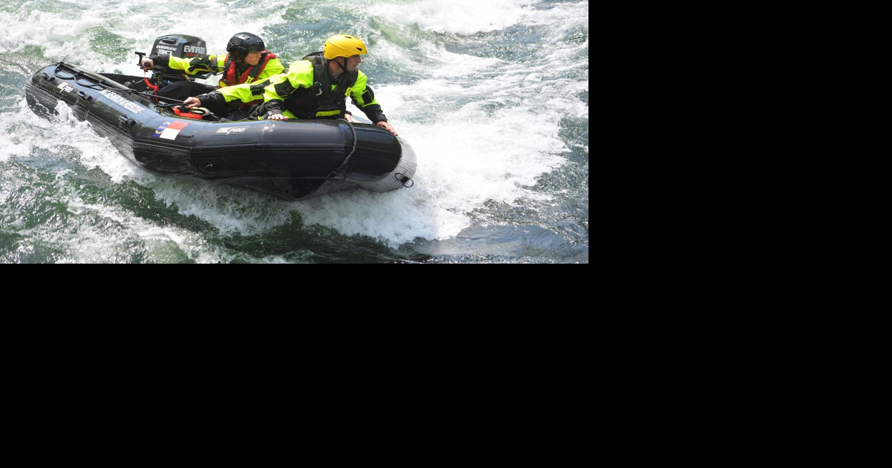 Burke swift water rescue teams work near Linville River NC
