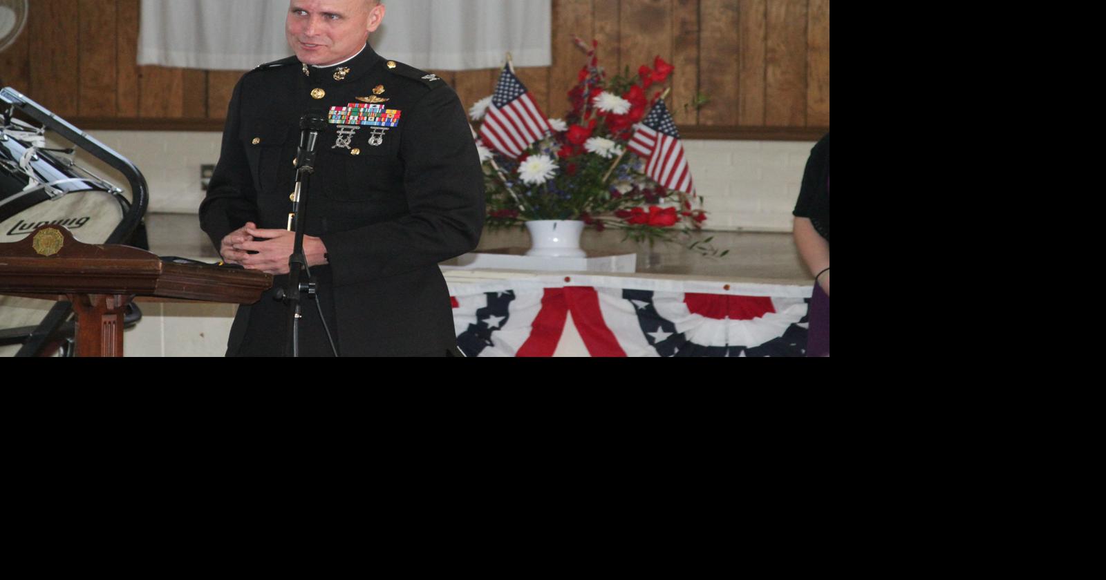 Colonel tells crowd about men who served and died