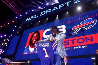 Cornerback Maxwell Hairston of Kentucky celebrates after being selected 30th overall by the Buffalo Bills during the first round of the NFL draft at Lambeau Field on Thursday, April 24, 2025, in Green Bay, Wisconsin.