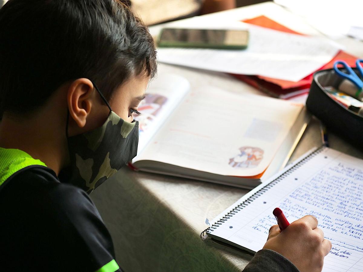 mnh-stock-boymaskschoolwork