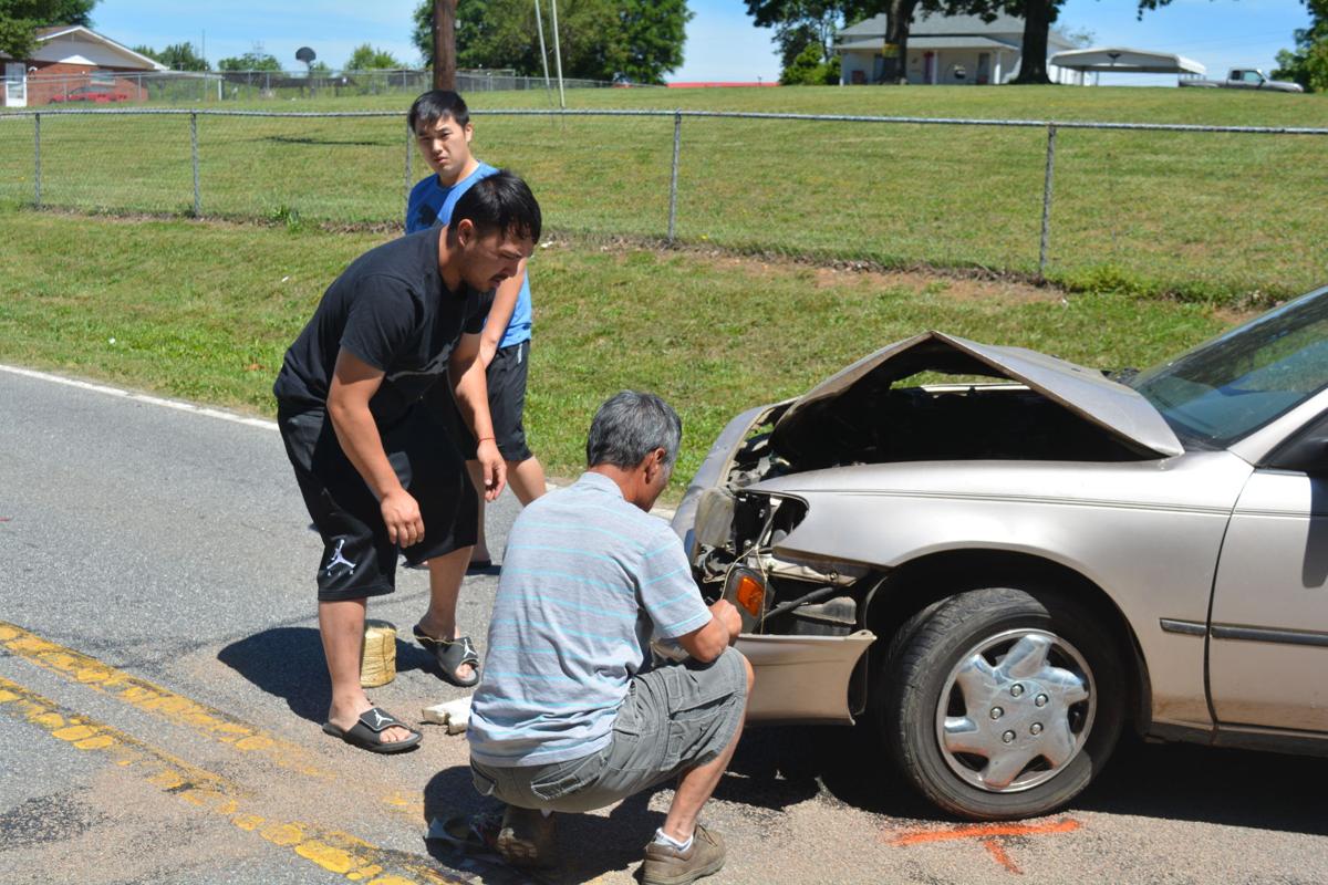 Man injured after motorcycle hits car Latest Headlines