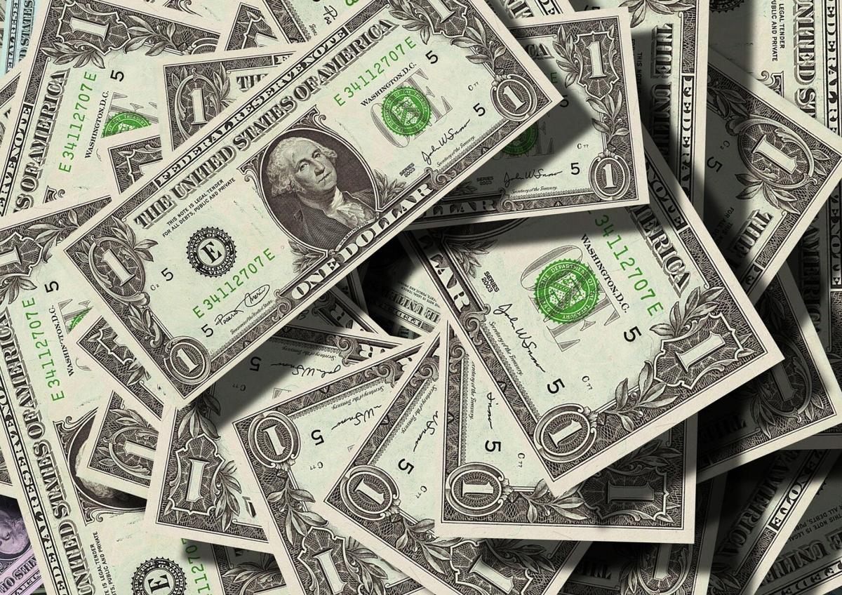 dollars money pile