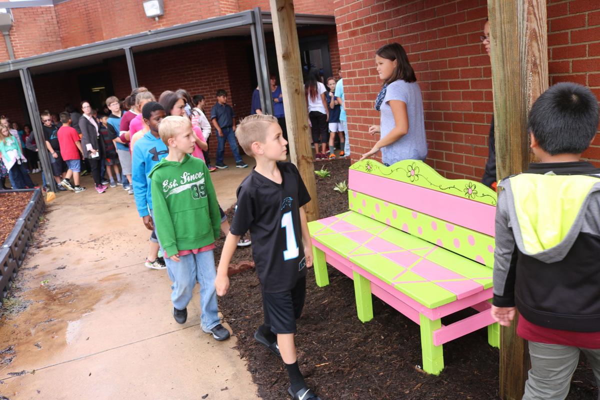 'Buddy Bench' dedicated in memory of students killed in house fire