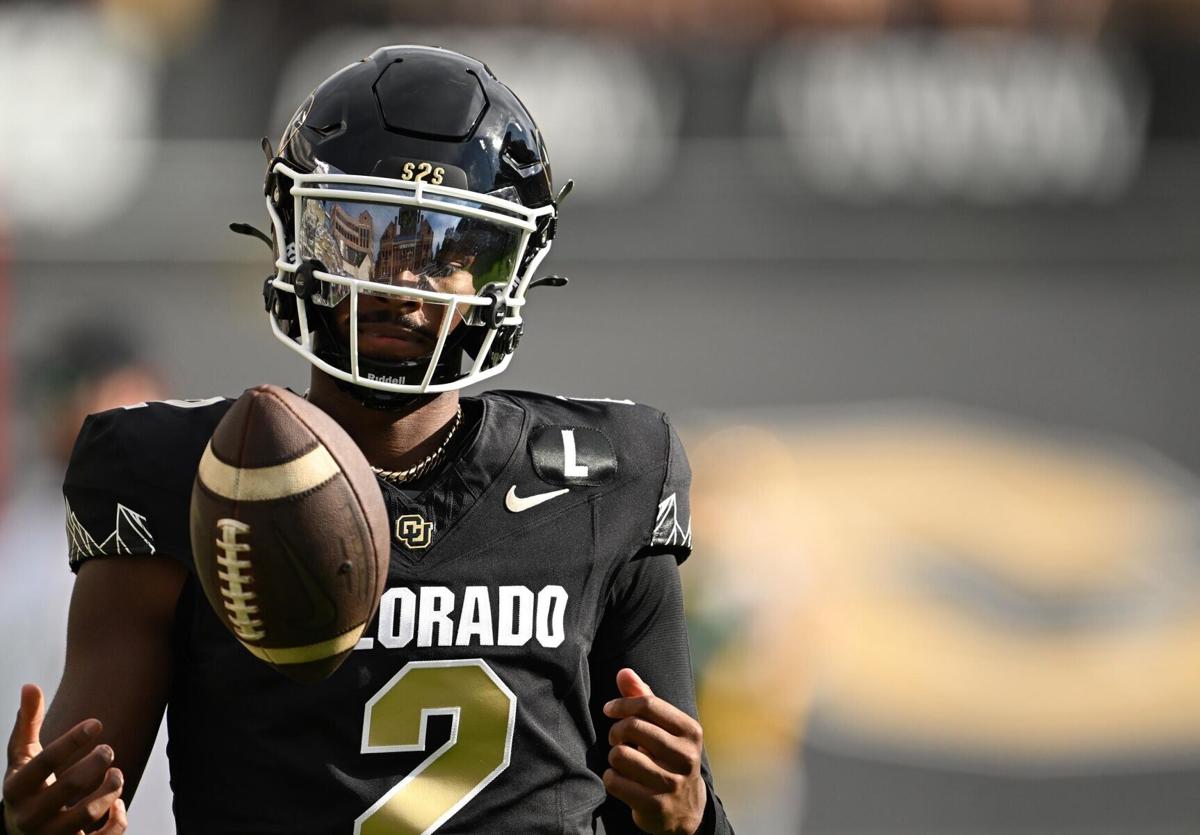 Colorado quarterback Shedeur Sanders warms up before the Buffaloes play host to North Dakota State at Folsom Field on Aug. 29, 2024, in Boulder, Colorado.