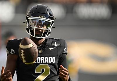 Colorado quarterback Shedeur Sanders warms up before the Buffaloes play host to North Dakota State at Folsom Field on Aug. 29, 2024, in Boulder, Colorado.