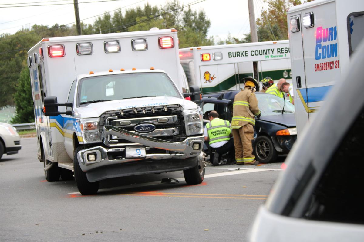 UPDATE Ambulance collides with car while responding to emergency call