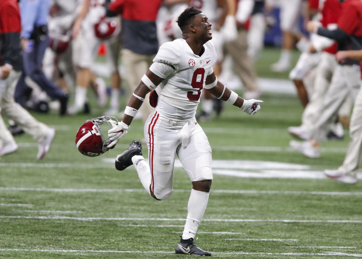 Alabama quarterback Bryce Young celebrates a win against Florida during the SEC Championship game at Mercedes-Benz Stadium in Atlanta on December 19, 2020.