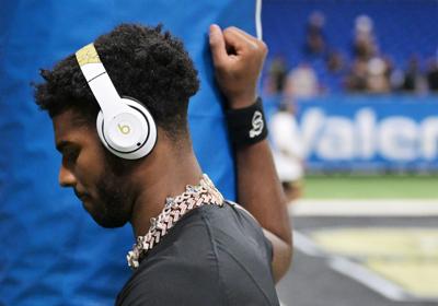 Colorado quarterback Shedeur Sanders warms-up before theValero Alamo Bowl against Brigham Young at the Alamodome in San Antonio, Texas, on Dec. 28, 2024.