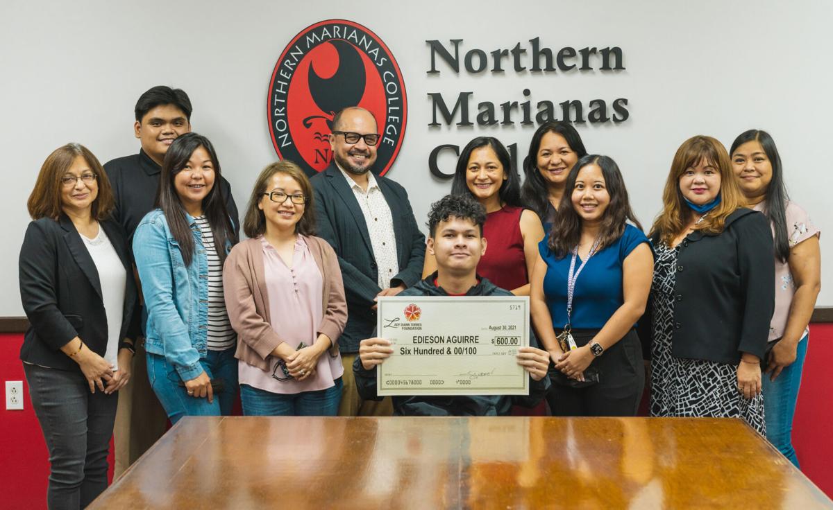 Northern Marianas College students Edieson Aguirre and Avry Racoma were recently awarded $600 each from the Lady Diann Torres Foundation.