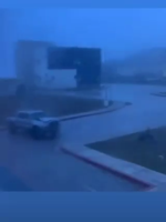 A pick up truck is blown away in Guam by Typhoon Mawar
