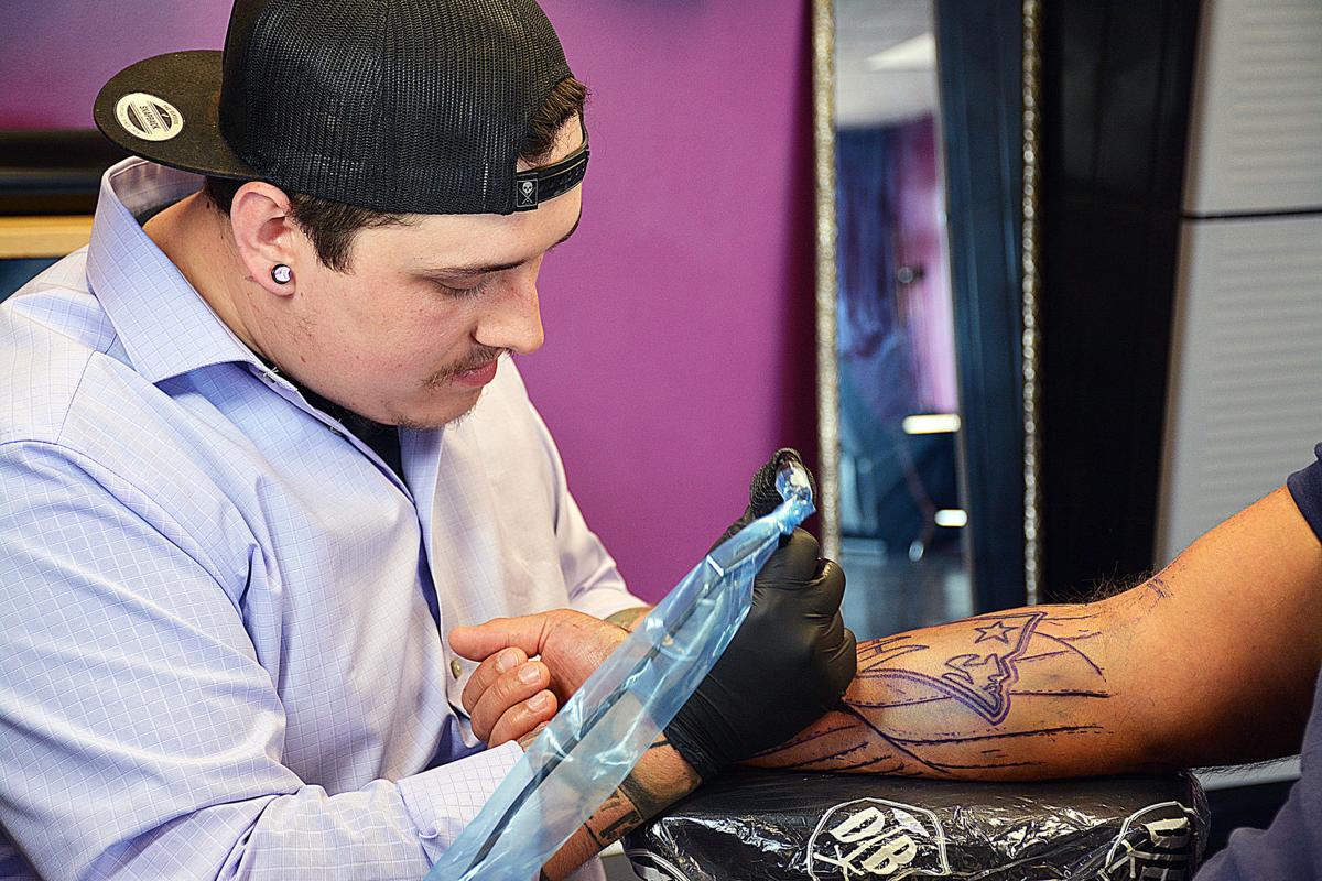 Tattoo artist inks spot in Smithville business community | Business |  