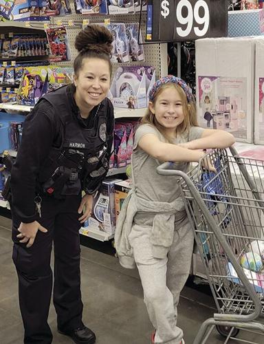 Shop with a Cop/Sheriff makes for young smiles & holiday cheer