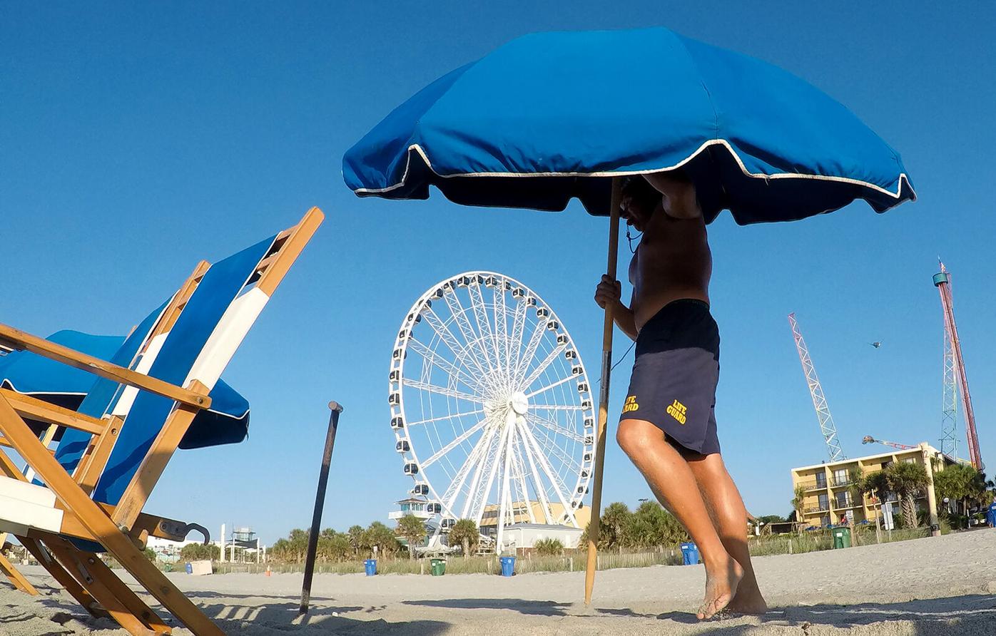 Myrtle Beach lifeguards set up for the day Gallery