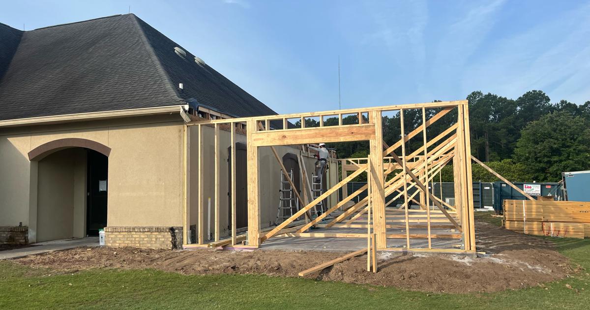 International Club's transformation to include drive-through turn house and store