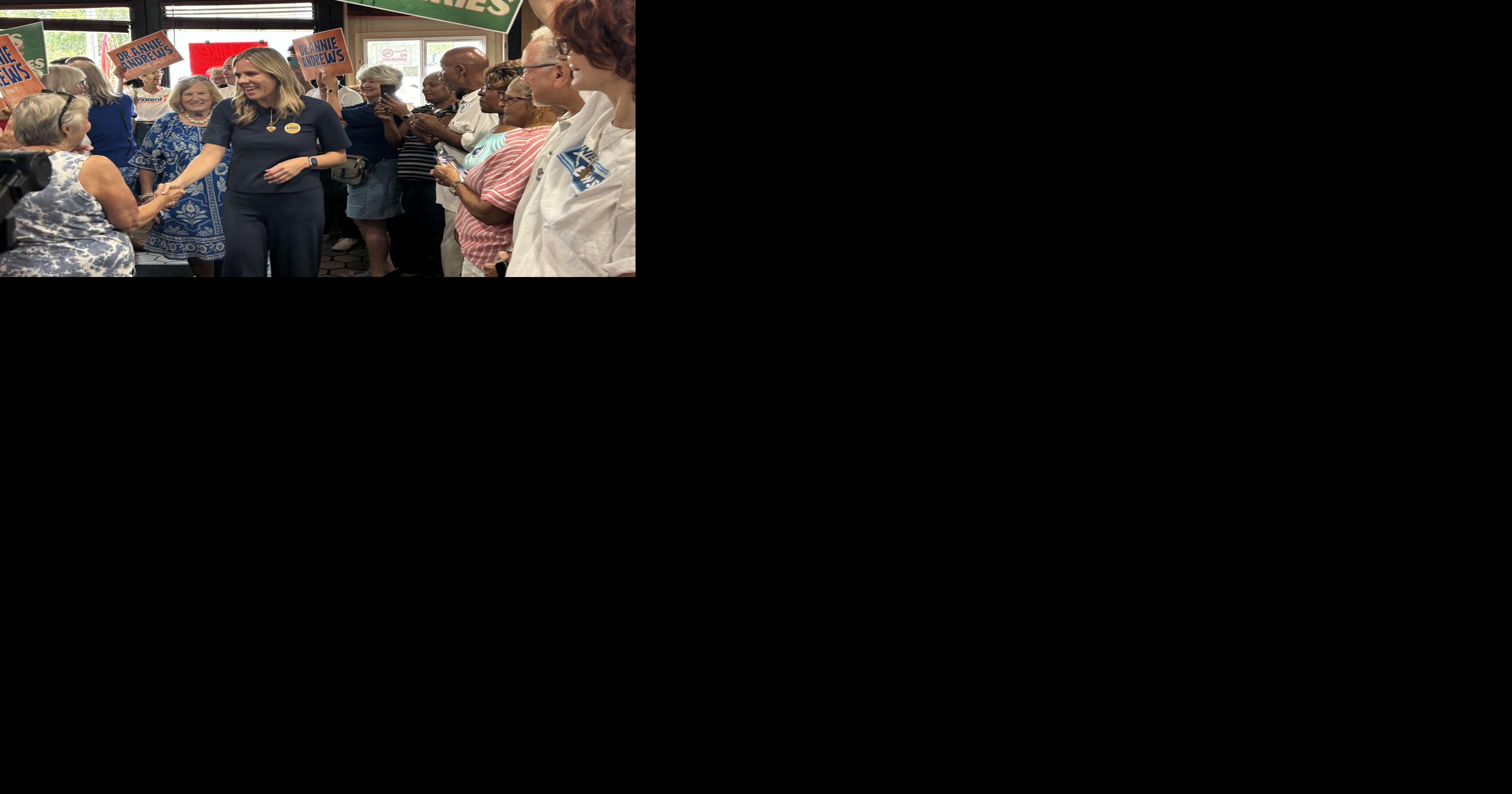Dr. Annie Andrews greets supporters at Big Mike's