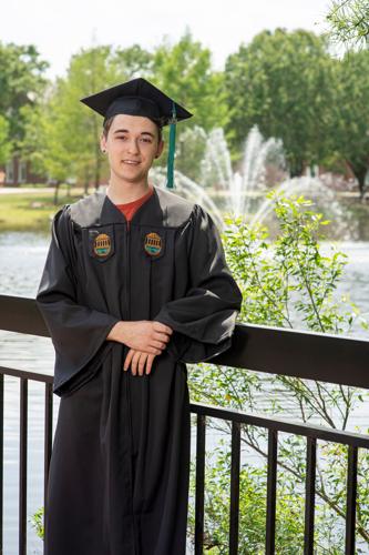 Colin Scholl graduation robes