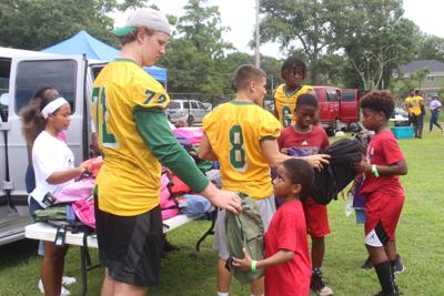 Free school supplies given out at Myrtle Beach block party ...