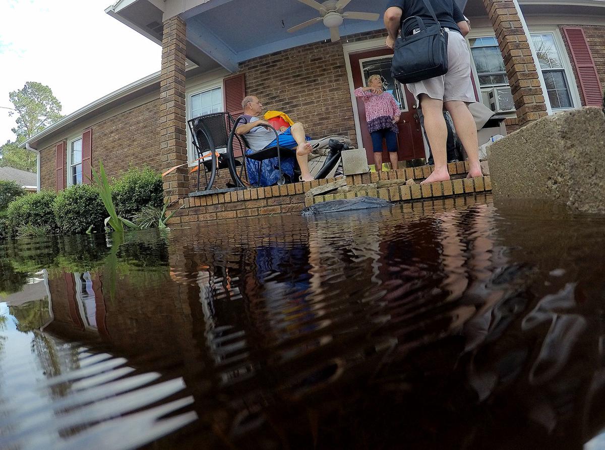 Loris begins assessing storm's damage, city hall loses part of roof