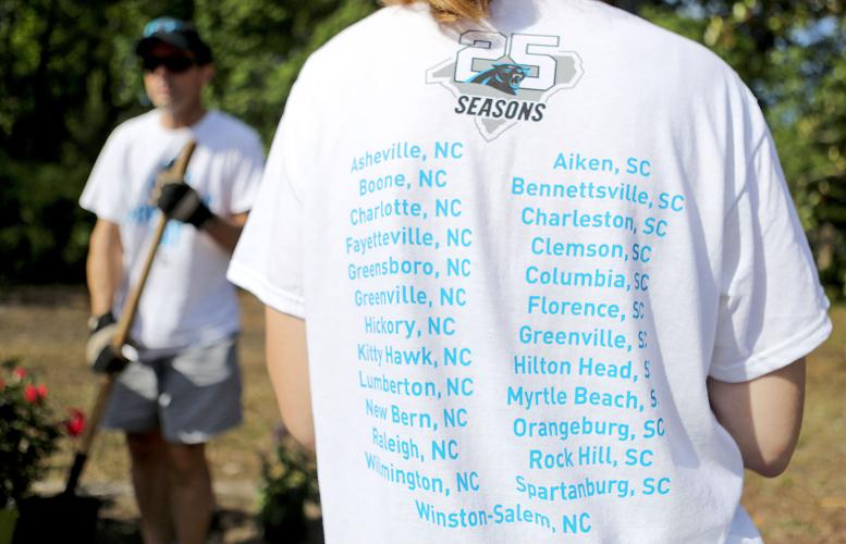 Carolina Panthers staffers plant flowers at Keep Pounding Day in Myrtle  Beach, Myrtle Beach