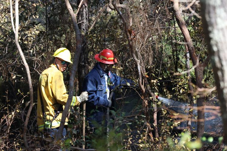 Firemen with hose