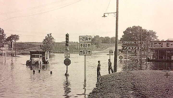 Stoplight was only about five years old when it was first flooded. This shot is from the edge of what is now the First Baptist Church toward the south, with the restaurant on the right.