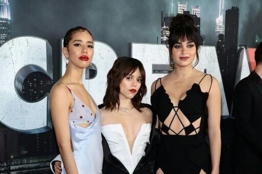 Jenna Ortega (c) and Melissa Barrera (r) will not return for Scream VI after a row about the war in Gaza