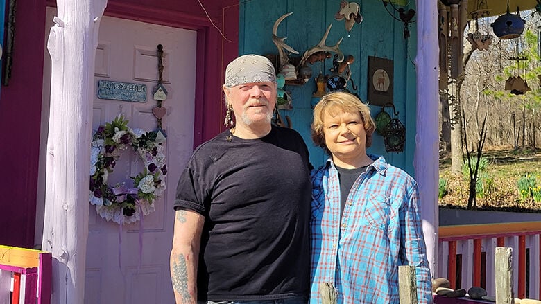 Jerry and Lea Ann Williams call their Hillsboro-area home the “Peace House.” Each side of the house is painted with different colors.