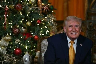 US President Donald Trump participates in NORAD Santa tracker phone calls, on Christmas Eve, from his Mar-a-lago club in Florida