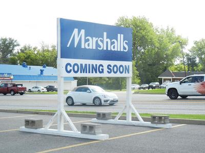 This sign has been placed outside the Twin City Mall where a Marshalls store is expected to open this fall.