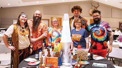 Pictured are the winners of the best costume and table décor at the 2024 Mastodon Rock N Roll Bingo.