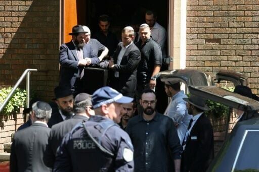 A coffin is carried out after the funeral of Boris and Sofia Gurman, who were killed in the December 14 Bondi Beach shooting attack