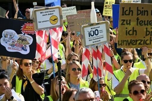 Protesters demonstrated outside Frankfurt airport as Lufthansa marked its centenary this week