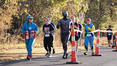Many participants dress up in Halloween costumes.