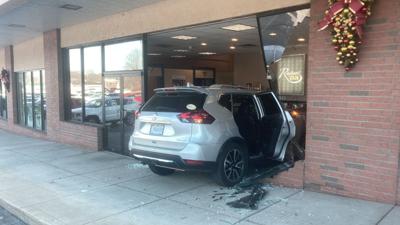 A woman driving this SUV accidentally crashed through Radiant Tan in Crystal City.