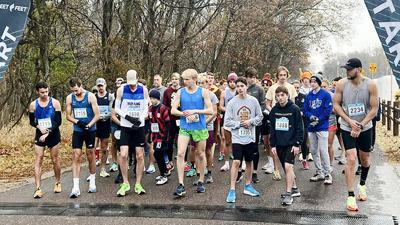 Participants line up for the start of the 2022 Gobble Gobble Run.