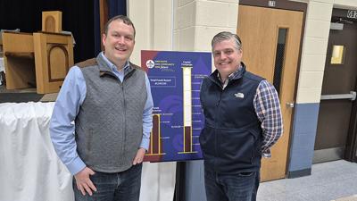 From left, Colin Doggett and Jason Hardin, co-chairs of the Holy Family Catholic Parish’s capital campaign committee.