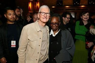 Tim Cook, left, says leading Apple has been 'the greatest privilege of my life'