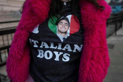 A supporter waits outside a federal courthouse in New York ahead of a January 2026 hearing for Luigi Mangione.