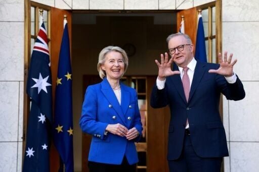 Australian Prime Minister Anthony Albanese (R) welcomes European Commission President Ursula von der Leyen for talks at Parliament House in Canberra on March 24, 2026