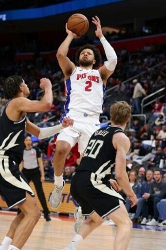 Detroit Pistons guard Cade Cunningham posted a double-double in his return from an 11-game NBA absence with a collapsed lung