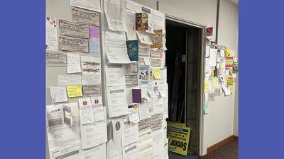 Notes of encouragement from Leader readers on display at the Leader office.