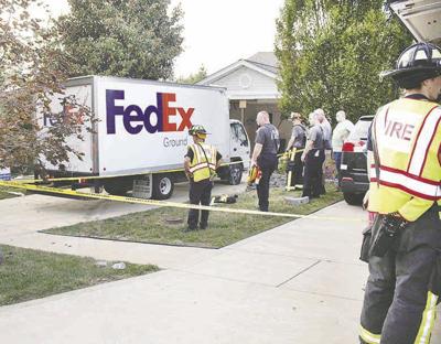 FedEx truck hits home in Fenton.
