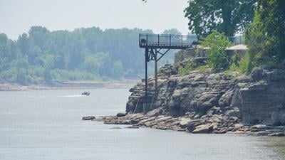 This view of the Mississippi River shows the exposed shore and deck of the Anheuser Museum and Estate House in Kimmswick.