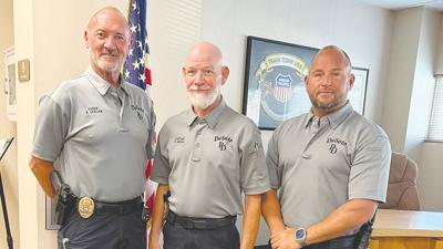 From left, De Soto Police Chief Brent Steger, Capt. Dirk Helms and Det. Eric Robinson have been busy searching for officers to fill the department’s ranks.