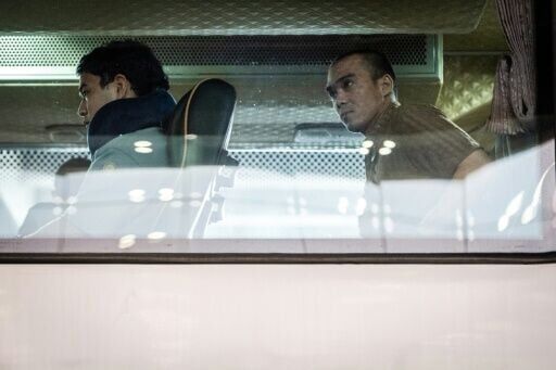 AFP journalists saw the returning crew members board a bus after arriving at the airport.