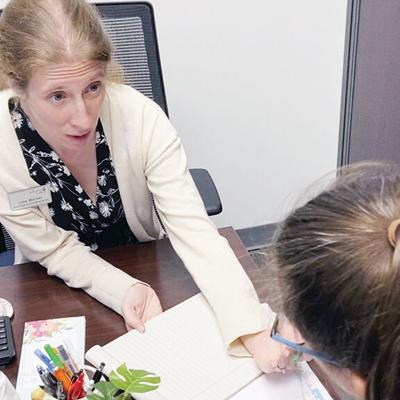 Lora Warner of Jefferson College gives advice on a resume at last year’s Job Fair.